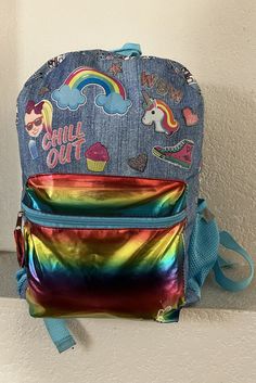 nickelodean  girl's backpack Colorful Large front pocket Adjustable strap Mesh pockets on both sides Condition is great Measurement - height 16" width 12" depth 5" Fun Multicolor Student Backpack, Playful Multicolor Backpack With Zipper Closure, Cute Multicolor Backpack For School, Multicolor School Backpack With Zipper Closure, Fun Multicolor Backpack For Back To School, Fun Multicolor Backpack, Casual Multicolor Backpack For Playtime, Cute Multicolor Backpack For Daycare, Multicolor Backpack For Daycare