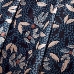 closeup of blue and gold patterned fabric