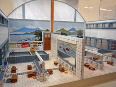 a model of an indoor swimming pool with tiled floors and walls, painted on the wall