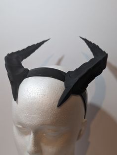 Here we have a set of Demon horns (2 x horns) which are 3d printed in ABS Like Resin and a black plastic headband. These can be supplied in a raw 3d printed finish that would need finishing and painting or in any custom colour/paint finish you could imagine.  They can be supplied as horns with a headband as a kit (will need prepping, priming, painting and gluing to the headband), and as with any 3d printed products there may be some small support artifacts that need to be sanded smooth as part of the preparation and finishing process. Or can be painted and finished in any custom colours and attached to a headband as shown in the photos. The horns have a 1 inch slot in the base of the horn to enable attachment to the headband. Raw kits can usually be dispatched within a week but custom sets Black Plastic Costume Accessories For Cosplay, Plastic Costume Accessories For Cosplay Halloween, Plastic Halloween Cosplay Costume Accessories, Plastic Costume Accessories For Halloween Cosplay, Black Horned Costume Accessories For Cosplay Events, Black Horned Mask For Cosplay, Black Horned Masks And Prosthetics For Cosplay, Black Horned Costume Hats For Cosplay, Black Horned Fantasy Costume Accessories