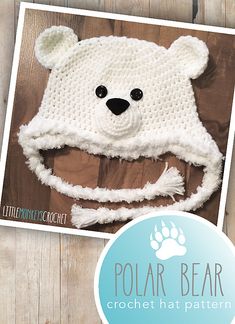 a crocheted bear hat is shown on a wooden background with the words polar bear written below it