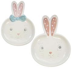 two white plates with pink and blue bunny ears