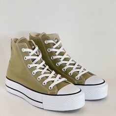 Converse Chuck Taylor All Star Lift Hi High Top Seasonal Color Mossy Sloth Khaki Brown / White / Black Canvas Women's Platform Sneakers / Boots A07571f Nwt Brand: Converse Model: Chuck Taylor All Star Lift Hi Style Code: A07571f Color: Mossy Sloth / White / Black Gender: Women's Size Guide: Us Women's 6.5 / Uk 4.5 / Eur 37 / Cm 23.5 Us Women's 7 / Uk 5 / Eur 37.5 / Cm 24 Up High Rise Above "Everyday" In These Platform Chucks. Boosted Height Gets You Closer To The Clouds, While Ultra-Comfy Cushio Casual Khaki Lace-up High-top Sneakers, Casual Khaki High-top Lace-up Sneakers, Casual Olive High-top Sneakers, Casual Olive Lace-up Sneakers, Converse Model, Brown Converse, Platform Chucks, Converse Platform, Women Platform Sneakers