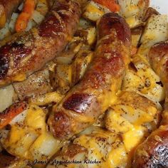 sausages, potatoes and carrots on a plate