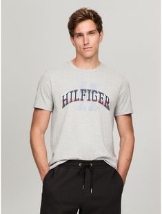 Tommy Hilfiger men's T-shirt. Made from lightweight cotton jersey, known for its breathability and stretch, our comfortable crewneck tee is cut in an easy fit and finished with our Hilfiger graphic.  Material: 100% Cotton. Tommy Hilfiger Sporty T-shirt With Graphic Print, Tommy Hilfiger Graphic Print T-shirt For Streetwear, Tommy Hilfiger Sporty Graphic Print T-shirt, Tommy Hilfiger Graphic Tee For Summer, Tommy Hilfiger Summer Graphic Tee, Tommy Hilfiger Crew Neck T-shirt With Graphic Print, Tommy Hilfiger Graphic Print Crew Neck T-shirt, Tommy Hilfiger Graphic Print T-shirt For Summer, Tommy Hilfiger Logo Print T-shirt For Streetwear