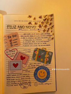 an open book with stickers on the pages and writing in spanish, english and french