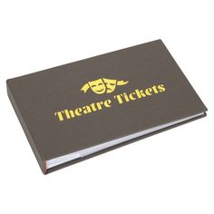 the theatre tickets book is open and ready to be used as an album or photo album