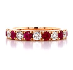 Ruby & Round Brilliant-cut Diamonds Eternity BandMetal: 18K Rose GoldRuby: 110 Round cuts 1.14ctw & 11 Ruby 0.94ctwSize: US 6 W: 4mm Luxury Heirloom Ruby Ring With Round Band, Luxury Round Rose Gold Ruby Ring, Luxury Rose Gold Ruby Ring Round Cut, Luxury Rose Gold Round Ruby Ring, Luxury Ruby Eternity Band In Fine Jewelry Style, Luxury Ruby Eternity Band In Classic Style, Luxury Ruby Birthstone Ring With Round Band, Luxury Ruby Classic Eternity Band, Luxury Ruby Round Band Jewelry