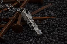 "I love to see guys full of jewelry too, and here is my new line of oxidized silver men's necklaces with / without stones. Rustic, geometric lines and the aged effect of 925 silver are the main features of this handmade men's necklace. Beautiful on its own, but perfect to wear with multiple necklaces, for a multi-layered look. NOTE: The rectangular pendant is massive and NOT Hollow. Ideal for yourself or as a gift for a loved one, for those looking for something different You can't go wrong. Per Unique Oxidized Finish Necklaces, Sterling Silver Brutalist Necklace For Gift, Brutalist Pendant Necklace For Gift, Mens Accessories Necklace, Multiple Necklaces, Necklace Man, Man Necklace, Men's Necklaces, Rectangle Necklace