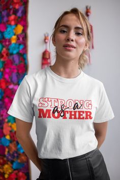 "Looking for a special gift for your strong and amazing mom this Mother's Day? Look no further than our \"Strong Mother\" t-shirt! This stylish and comfortable t-shirt is the perfect way to show your appreciation for all that your mom does. Featuring the phrase \"Strong as a Mother\" in bold, eye-catching letters, this t-shirt is made from soft and breathable fabric that will keep your mom comfortable all day long. It comes in a range of sizes to fit all body types, and is available in a variety Trash Panda Shirt, Faith Tshirts, Positive Shirt, Easter T Shirts, Retro Tops, Jesus Shirts, Trend Fashion, T Shirts With Sayings, Trendy Tshirts