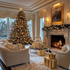 a living room filled with white furniture and a christmas tree in the middle of it