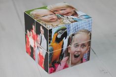 a box with pictures of children and birds on the front is sitting on a table