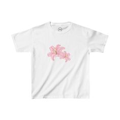 This Pink Lily Flower Baby Tee is so cute and trendy! Perfect for you or a friend. Makes for a great gift!  **These shirts are meant to be fitted and run on the smaller side. If you would like a looser fit, we recommend sizing up.  Made with love <3  : Made with 100%, midweight (5.3 oz/yd² (180 g/m US cotton that feels soft to the touch and a great choice for any season. .: The crew neckline along with the tee's classic fit, deliver a timeless style that is perfect for daily use. .: All t-shirts Cute Floral Print Short Sleeve T-shirt, Fitted Pink Y2k T-shirt, Light Pink Baby Tee, Pink Floral Print Y2k Tops, Bebe Shirt 2000s, Pink Cotton Hello Kitty T-shirt, Cheap Pink T-shirt With Rose Print, Pink Lily Flower, Floral Tee