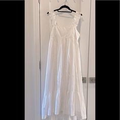 Free People White Maxi Dress. Hem Is Higher In Front Then Back. Ruffle Straps And Ruffle Hem. Fully Lined. Never Worn Without Tags. Size X-Small. Elegant Ruffled Midi Dress For Daytime, Chic Daytime Maxi Dress With Ruffles, Chic Ruffled Maxi Dress For Daytime, White Lace Maxi Dress, White Maxi Dress, White Maxi, Lace Maxi Dress, White Maxi Dresses, Free People Dresses