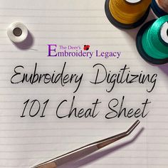 embroidery digitizing 101 heat sheet with scissors and spools of thread next to it