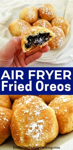 air fryer fried oreos on a plate with powdered sugar in the middle