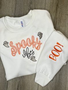 Halloween Spooky Boo Embroidered Crewneck soft and warm sweatshirt.   -Spooky Boo is created on  Unisex white Jerzees Nublend Crewneck sweatshirt. -We use multiple quality brands such as Hanes and/or Gildan.  -Processing and shipping 5-7 days  - Shipping  on Saturday  - Sundays processed orders will ship Monday Halloween Long Sleeve Sweatshirt With Custom Embroidery, Long Sleeve Halloween Sweatshirt With Custom Embroidery, Long Sleeve Custom Embroidered Sweatshirt For Halloween, Long Sleeve Sweatshirt With Custom Embroidery For Halloween, White Hoodie With Custom Embroidery For Fall, Halloween White Embroidered Sweatshirt, Halloween White Sweatshirt With Embroidered Graphics, Halloween Embroidered Crew Neck Hoodie, White Halloween Sweatshirt With Embroidered Graphics