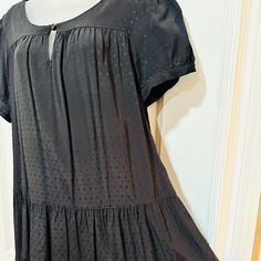 H&M Women’s Black Rayon Short Sleeve Ruffled Dress (Nwot) This Fun And Flirty Black Rayon Dress Has A Flowy Fit With A Dropped Waist. The Fabric Is A Soft Rayon With A Slight Sheen And Subtle Diamond-Shaped Pattern Detail Throughout. The Front Has A Keyhole With Button Detail At The Collar And On Each Sleeve, With 2 Ruffles At The Bottom. It’s Lightweight And Comfortable And Can Be Dressed Up Or Dressed Down With Year-Round, All-Seasons Styling Options. Wear With Sandals During Spring/Summer And H&m Black Mini Dress For Day Out, H&m Short Sleeve Dresses With Ruffles, Chic Short Sleeve Mini Dress By H&m, Chic H&m Short Sleeve Mini Dress, Chic H&m Mini Dress With Short Sleeves, Flowy Ruffled Dresses By H&m, H&m Flowy Ruffle Dresses, H&m Flowy Ruffled Dresses, H&m Short Sleeve Dress For Date Night