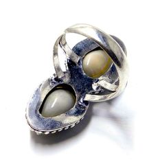 Weight of ring 5.5 Gm Head Sell Size 11x33 mm (APPROX.) 100% Cowrie shell natural stone, Metal:Sterling Silver Stamped:925 i make jewelry for a very special kind of Women's men's ,This stunning is handcrafted by one of our talented artisans. It is set in precious Fine Jewelry 925 Sterling Silver Jewelry, Polished to a brilliant luster> You can also contact us for a separate order, or place an order? Send items back within: 30 days of delivery Request a cancellation within: 2 Hours of purchase Silver Shell-shaped Ring For Gift, Unique Silver Shell Rings, Artisan Teardrop Adjustable Rings, Unique Pearl Promise Ring, Silver Shell Rings For Gift, Unique Teardrop Nickel-free Rings, Unique Handmade Pearl Promise Ring, Handmade White Bohemian Opal Ring, Bohemian Handmade Collectible Rings