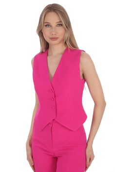 Elevate your style with our Women's Fuchsia Short Slim Fit Vest, a versatile piece that adds a pop of color to any ensemble. This sleeveless waistcoat is tailored to provide a flattering silhouette, making it perfect for both casual outings and formal occasions. Crafted from high-quality materials, it offers a comfortable fit and lightweight feel. The vibrant fuchsia hue makes a bold statement, ensuring you stand out wherever you go. Pair it effortlessly with jeans for a chic daytime look or layer it under a blazer for a polished office outfit. Available in various sizes, our vest caters to different body types, promising a comfortable and stylish fit for all. Discover the perfect blend of fashion and functionality with our Women's Fuchsia Short Slim Fit Vest. Explore our collection today Pink Fitted Sleeveless Vest, Fitted Solid Color Vest For Spring, Fitted Solid Vest For Spring, Solid Fitted Vest For Spring, Fitted Pink Vest Outerwear, Chic Pink Vest, Chic Pink V-neck Vest, Chic Pink Vest For Workwear, Spring Workwear Pink Vest