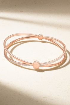 The two intersecting bands of Pomellato's 'Together' bracelet symbolize interconnectedness. It's crafted from 18-karat rose gold and frosted along one bar with scores of diamonds in a rhodium-plated setting. We think it makes a thoughtful gift for someone special. Adjustable Modern Rose Gold Bangle, Timeless Double Band Rose Gold Jewelry, Timeless Rose Gold Double Band Jewelry, Adjustable Polished Rose Gold Bangle, Adjustable Rose Gold Bangle With Polished Finish, Modern Rose Gold Bangle, Modern Rose Gold Round Bangle, Rose Gold Metal Bracelet With Polished Finish, Elegant Double Band Jewelry With Polished Finish