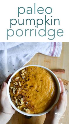 a person holding a bowl of pumpkin porridge