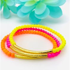 Set Of Three Stretch Bracelets In Neon Pink, Orange And Yellow. 4mm Glass Beads And Gold Tube Bead On Elastic String Handmade And New Thank You For Your Interest! Trendy Yellow Beaded Bracelets With Tiny Beads, Trendy Yellow Beaded Bracelets, Trendy Yellow Friendship Bracelets With Colorful Beads, Vibrant Adjustable Yellow Beaded Bracelets, Trendy Yellow Bracelets With Tiny Beads, Yellow Stretch Bracelet With Colorful Beads For Summer, Vibrant Yellow Beaded Bracelets As Gift, Trendy Yellow Beaded Friendship Bracelets, Adjustable Yellow Stretch Bracelet With Tiny Beads