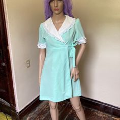 "Women's S-M Poly 36\" bust 28\" waist 44\" hips 33\" length Wow!! A real stunner, I love this little minty green mini wrap dress, pair it with some knee high socks and chunky Mary Janes for an absolutely amazing outfit. Closes at the waist with a little snap and ties at the side. In great vintage condition with no major flaws." Cute Green V-neck Mini Dress, Cute Knee-length Mini Dress For Daywear, Feminine Green Mini Dress For Daywear, Fitted Feminine Green Mini Dress, Chunky Mary Janes, Baby Blue Maxi Dress, Kimono Wrap Dress, 60s 70s Fashion, Brown Floral Print