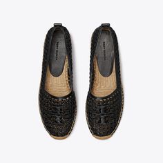 A warm-weather essential is hand crocheted in Japanese paper raffia and detailed with a hand-stitched Double T. Set on a jute platform, the effortless slip-on is lightweight and breathable. Crafted in partnership with a Leather Working Group-certified tannery, supporting high standards in leather manufacturing and chemical management. Vacation Woven Leather Slip-on Espadrilles, Beach Woven Leather Espadrilles, Leather Espadrilles With Woven Detail For Vacation, Leather Woven Espadrilles For Beach, Beach Leather Espadrilles, Jute Espadrilles With Woven Sole And Round Toe, Woven Straw Espadrilles With Round Toe, Natural Woven Straw Espadrilles, Beach Woven Leather Espadrilles In Natural Color