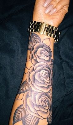 a woman's arm with tattoos on it and the words, black women tattoos