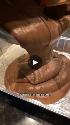 someone is making something out of some kind of chocolate