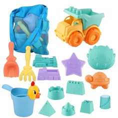 play set with plastic toys including sand, shovels and bucket