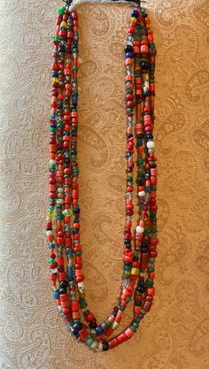 4 strands of old Nepal Newari woman necklace - worn by the local women .  all old glass -  i got these in the 1980s and can't really find anymore Traditional Fair Trade Beads For Jewelry Making, Traditional Multi-strand Beaded Necklaces, Unique Multi-strand Hand-strung Beads, Vintage Multi-strand Colorful Beaded Necklaces, Vintage Multi-strand Beaded Necklaces With Colorful Beads, Vintage Multi-strand Beaded Necklace With Colorful Beads, Unique Multi-strand Polished Beads, Vintage Multicolor Multi-strand Beads, Traditional Multi-strand Polished Beads