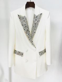 Gorgeous White Rhinestone Crystal Blazer Dress . Add some class and sass to your wardrobe with this stunning blazer dress.  * Sizing - All items are made according to measurement ranges, they are NOT typical letter or numeric sizing. It is imperative to compare your exact measurements with the size chart provided either in the listing photos or item descriptions and to also add your measurements under Personalization. If you have any questions on sizing, please feel free to message me. Do not order your normal size without taking and comparing measurements. * Made to order items such as feather tops, jackets, dresses and rhinestone/crystal dresses are NON-REFUNDABLE/EXCHANGEABLE. If you have a problem with your order, please contact me and I will do my best to rectify the problem. Please u Elegant Fitted Blazer With Rhinestones, Elegant Evening Blazer With Rhinestones, Elegant Party Blazer With Rhinestones, Elegant Rhinestone Blazer For Party, Fitted Rhinestone Blazer For Party, Fitted Party Blazer With Rhinestones, Elegant Long-sleeved Blazer With Rhinestones, Glamorous Fitted Blazer With Rhinestones, White Embellished Blazer For Party