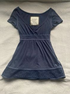 not mines | notes: abercombie and fitch baby doll shirt | tags: #2000s #fashion #doll #coquette #coquetteaesthetic #abercrombie #aesthetic 2000s Abercrombie, Babydoll Shirt, 2000s Clothes, Adidas Shirt, Henley Top, Cute Everyday Outfits, Babydoll Top, Vintage 2000s, Blue Top