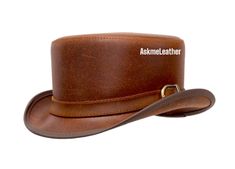 Leather Top Hat Buckle Leather Band Style - Brown Top Hat Handmade with 100% Cowhide Leather Gift for him New with Tags Description: * High-Quality Craftsmanship handmade * Real Leather * 100% pure leather **Those living in remote areas will have to pay $45 extra as shipping charges before the item is shipped. Sizing: Heads come in all sizes, and in a lots variety of shapes. Although high quality hats are adaptable, and will usually conform to differences in shape with a little wearing, it is essential that the size be correct for the head. To determine your hat size, measure the circumference around your head, keeping the tape level and firm, across the temples and above the eyebrow ridges. Check the size chart given below. For in-between measurements use the next size up. Hat Care: Any s Australian Cowboy Hat, Leather Top Hat, Brown Cowboy Hat, Leather Cowboy Hats, Steampunk Top Hat, Steampunk Hat, Hat Handmade, Quality Hats, Brown Top