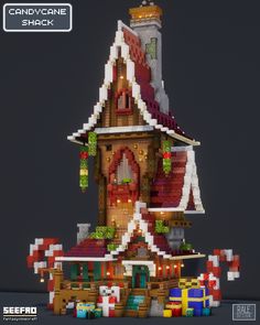 an image of a house made out of legos and christmas lights on the roof