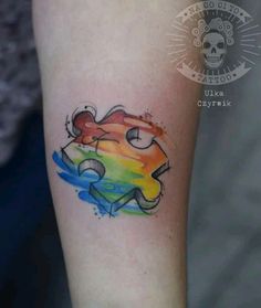 a person with a colorful tattoo on their arm