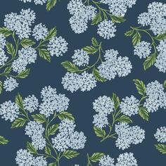 a blue and white floral pattern with green leaves