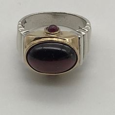 The Ring Is Stunning. The Entire Top Portion Is Solid 14k Gold. The Shank Gleaming Sterling. It Is Adorned With Garnet Cabochons Front And Back. The Crowning Glory Is The Large Single Garnet Cab That Is The Focal Point Of The Ring. Garnet Ring, Ring Color, Garnet Rings, The Ring, Womens Jewelry Rings, Focal Point, Garnet, Jewelry Rings, Women Jewelry