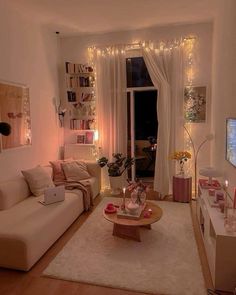 a living room filled with furniture and a flat screen tv