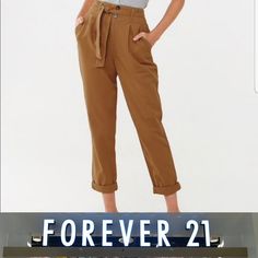 Forever 21 Contemporary Juniors Large (Small Waist 16 Inches) 22" Hip 12.5 Thigh 10" Ankle Chesnut In Color Cuffed Ankle Pleated Waist 2 Front Pockets Back Pockets Matching Belt See Photos For Measurements Brown Paperbag Waist Pants For Fall, Trendy Paperbag Waist Bottoms For Fall, Forever 21 Cotton Bottoms For Fall, Forever 21 High Waist Fall Pants, Forever 21 High Waist Pants For Fall, Fall Forever 21 Straight Leg Bottoms, Forever 21 High-waist Fall Pants, Forever 21 Fall Trousers, Trendy Fitted Pants With Paperbag Waist