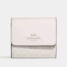 Brand New Optic White/Silver Signature Coated Canvas And Leather Small Wallet From Coach. Gift Box Included Luxury White Coach Wallet, Coach White Rectangular Wallet, Elegant White Compact Wallet, Elegant Compact Coach Wallet, White Coach Wallet For Gift, White Bifold Wallet For Gift, White Bifold Wallet As Gift, Chic White Bifold Wallets, Elegant White Rectangular Wallet