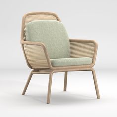 a chair that is made out of wood and has a light green upholstered seat