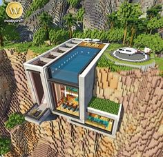 an aerial view of a house built into the side of a cliff in minecraft