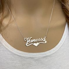 Description: 925 Sterling Silver Name Plate Heart Necklace - Vanessa Item No.: C01 Metal Type: .925 Sterling Silver With Stamped 925 Finish: High Polish Measurement: 16" - 18 Inches. Pendant: 1.5" X 0.75" Brand New With Box Silver Heart-shaped Custom Necklace For Valentine's Day, Silver Heart-shaped Custom Necklace For Anniversary, Silver Heart-shaped Necklace For Anniversary, Sterling Silver Open Heart Name Necklace, Silver Name Necklace With Open Heart Shape, Silver Heart-shaped Custom Name Necklace, Silver Double Heart Custom Name Necklaces, Silver Heart Shaped Custom Name Necklace, Custom Name Heart-shaped Silver Necklace