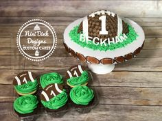 a football themed cake and cupcakes on a table