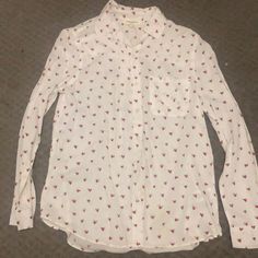 Women’s Blouse. Brand New. Never Worn. White Button Down With Red Hearts. Has A Pocket. Size Extra Small. Casual Heart Print Shirt For Spring, Long Sleeve Heart Print Shirt For Spring, White Casual Blouse With Heart Print, Cute White Blouse With Buttons, White Shirt With Heart Graphic For Spring, Summer White Blouse With Heart Print, Cute Long Sleeve Red Blouse, White Heart Print Blouse For Summer, Cute Red Long Sleeve Blouse