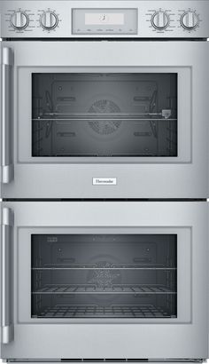 two stainless steel ovens side by side