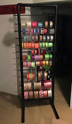 a rack with many different types of ribbons on it